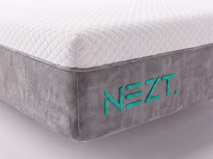 Detalle de la tela y el bordado del colchón NEZT Caja (espuma)